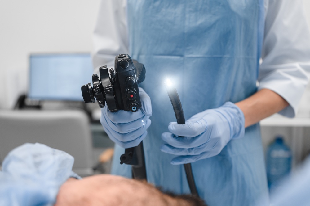 Doctor holding modern endoscope device